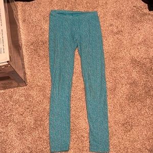 Cat and Jack XL girls leggings. Blue with different colored polka dots.